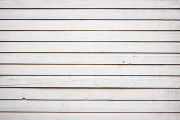 Old, white abstract house exterior wall from wood.