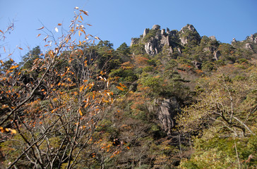 Huangshan Mountain in Anhui Province, China. View of cliffs and peaks as seen from the eastern steps. Huangshan (Yellow Mountain) is famous for its rugged cliffs, soaring peaks and forested slopes.