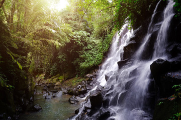 Kanto Lampo waterfall in jungle, Ubud, Bali, Indonesia