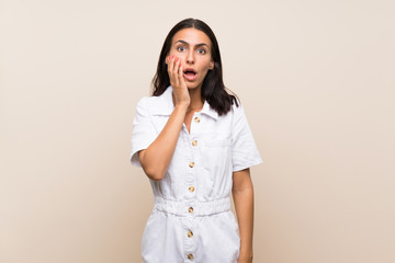 Young woman over isolated background with surprise and shocked facial expression