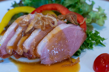  smoke duck slice salad on plate