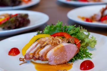  smoke duck slice salad on plate