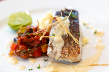  snow fish steak on white plate
