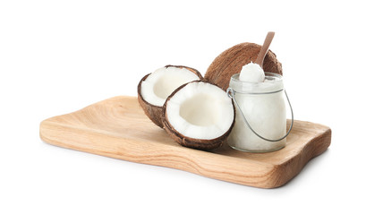 Composition with organic coconut oil on white background. Healthy cooking
