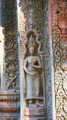Stone rock carving art at Ta Prohm Temple in Angkor wat complex, Siem Reap Cambodia.