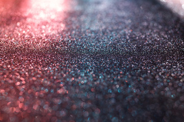 Pink and gray glitter texture abstract background. Defocused bokeh.