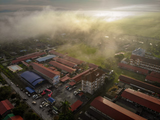 Aerial shot of rural area at morning.