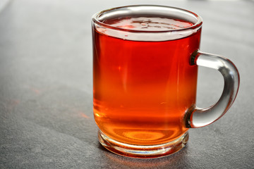 Glass cup with delicious fruit jelly.