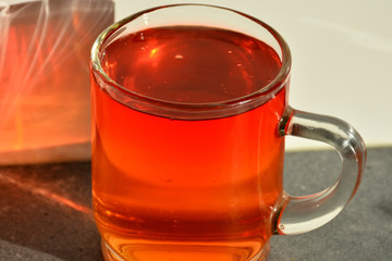 Glass cup with delicious fruit jelly.