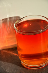 Glass cup with delicious fruit jelly.