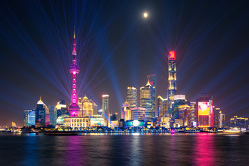 laser show over Lujiazui skyline and Huangpu river, Shanghai, China