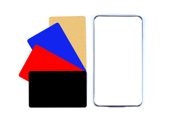 Black, red, blue and Gold credit cards and mobile phone isolate on white background.