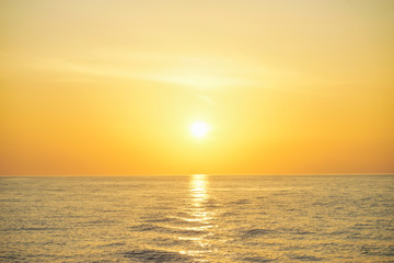 Fototapeta premium Golden sunrise and golden north andaman sea . Sunrise over the sea near Similan Islands National Park, Phang Nga Province, Thailand, Asia.