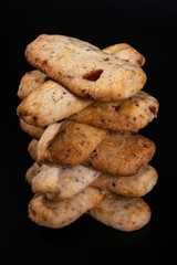 Hazelnut biscuits on the dark background