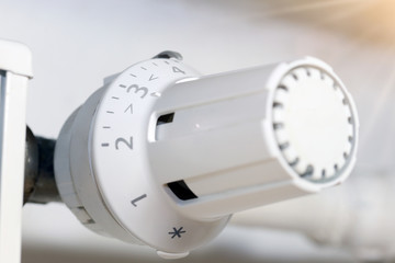 Close-up of a thermostat on a radiator