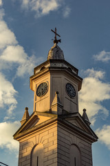 Fototapeta na wymiar tower of a church with a cross