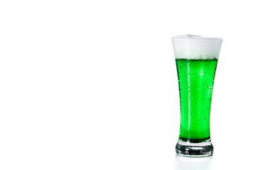 Traditional St Patrick's Day green beer isolated on white background. Copy space