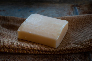 natural milk soap, on rustic background.