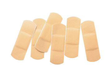 Medical sticking plasters isolated on white. First aid item