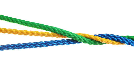 Twisted colorful ropes isolated on white. Unity concept