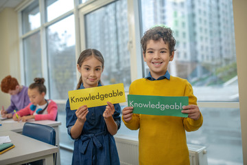 Children playing words game during the lesson