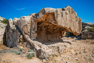 Fototapeta premium For the wealth of burials of the inhabitants of ancient Paphos, this place was called the Royal Tombs. But the Romans plundered the graves and set up a quarry here. 