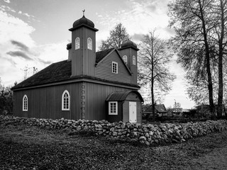 Black and white photo of wooden architecture (mosque). Analog photograph digitized (negative scan)....