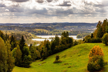 Rural landscape in Suwalki Landscape Park. Hills (eskers), valleys and lakes, post glacial terrain. View point at Around Lake Jaczno educational path.