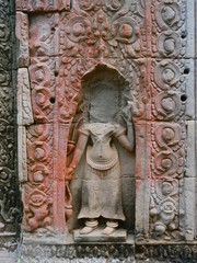 Stone rock demolished carving art at Preah Khan temple Angkor Wat complex, Siem Reap Cambodia. A popular tourist attraction nestled among rainforest.