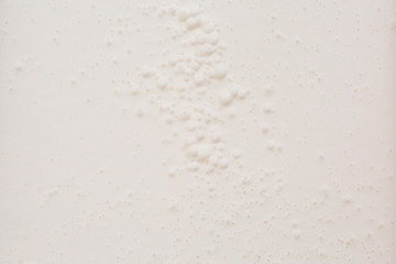 Cream white color. Background, texture. Top View