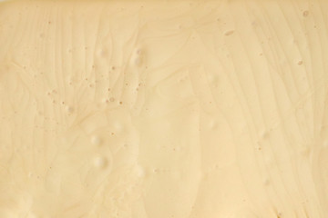 Butter cream white color. Background, texture, close up. Top View