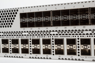 detail of fiber optic gigabit ethernet switch with SFP module slot and UTP category 5 connectors...