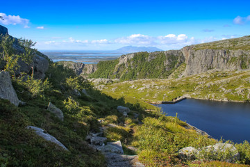 Fototapeta na wymiar Landscape picture from Vedal fresh water reservoir in Brønnøy municipality, Northern Norway
