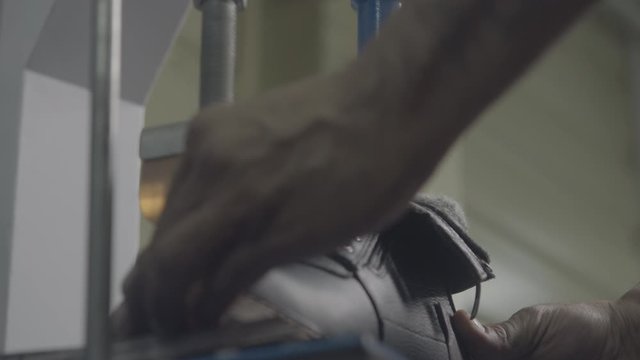 Shoe factory process of making shoes using machines and technologies