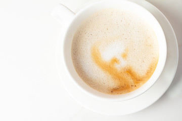 cup of coffee with cream on white background
