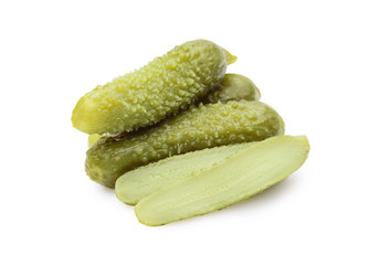 three marinated pickled cucumbers isolated on white