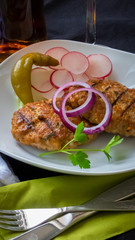chopped steak grilled with red onions radishes and hot peppers