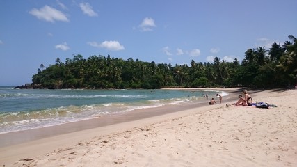 Tropical beach, blue water, holidays in Sri Lanka