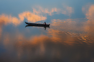 boat on Irrawaddy hover in to the sky