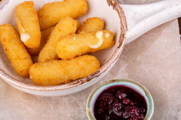Cheese sticks with cranberry sauce