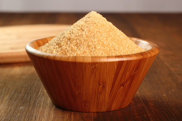 Cane Sugar in wooden bowl