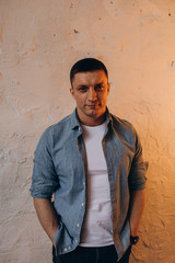 Fototapeta premium Photo session of a young guy. Classic portrait of a confident man.