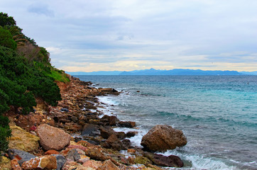 Scenic winter landscape of Glyfada Beach in Athens. Saronic Gulf. Famous public beach. Natural composition. Romantic and peaceful scene. Athens, Greece