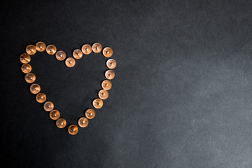 Heart shaped stationery buttons with semicircular hats