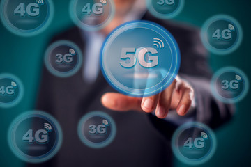 Businessman in suit press virtual 5g button. People and technology concept