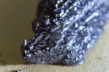 Crystals of iodine, iodine in metal form.