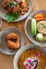 northern thai food on wooden table