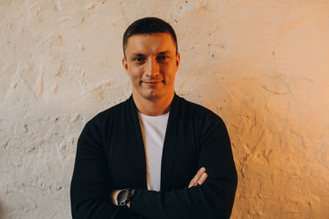 Photo session of a young guy. Classic portrait of a confident man.