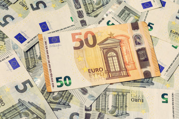 The extraordinary texture of European currency 50 euros outweigh 5 euros.