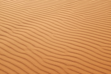 Orange desert sand patterns for a warm background